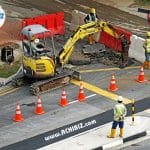 Construction Workers working on road