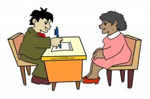 A person is interviewing a woman