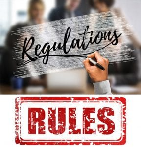 A hand writing of Rules & Regulations sign