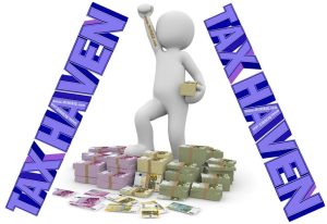 A Man standing on currencies with tax haven sign